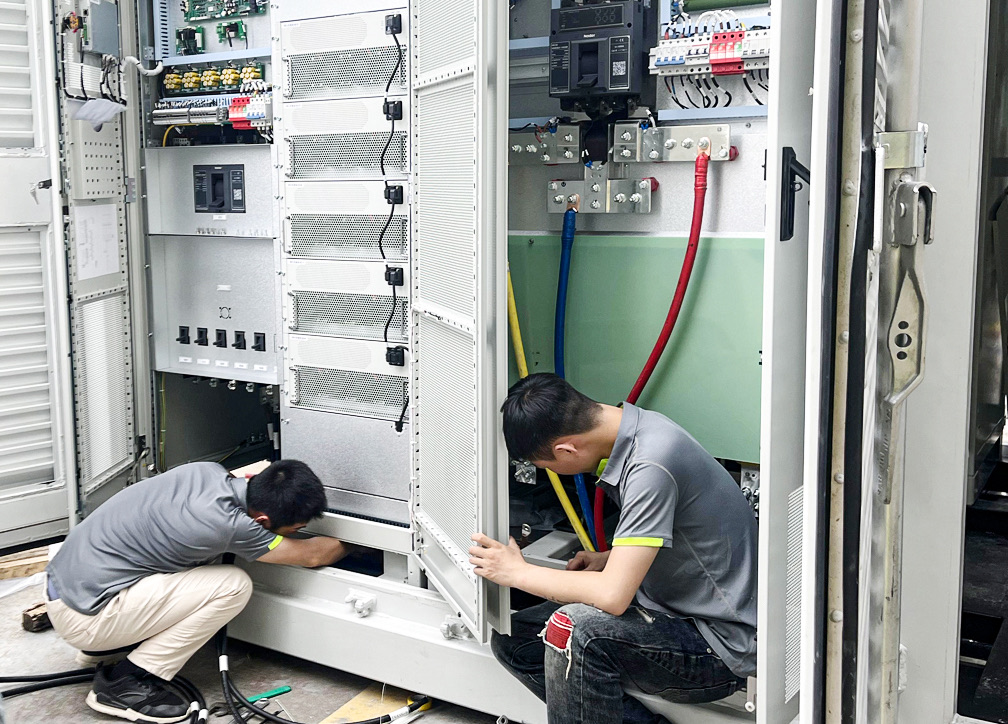 Commissioning electrical equipment inside a container-based energy storage system